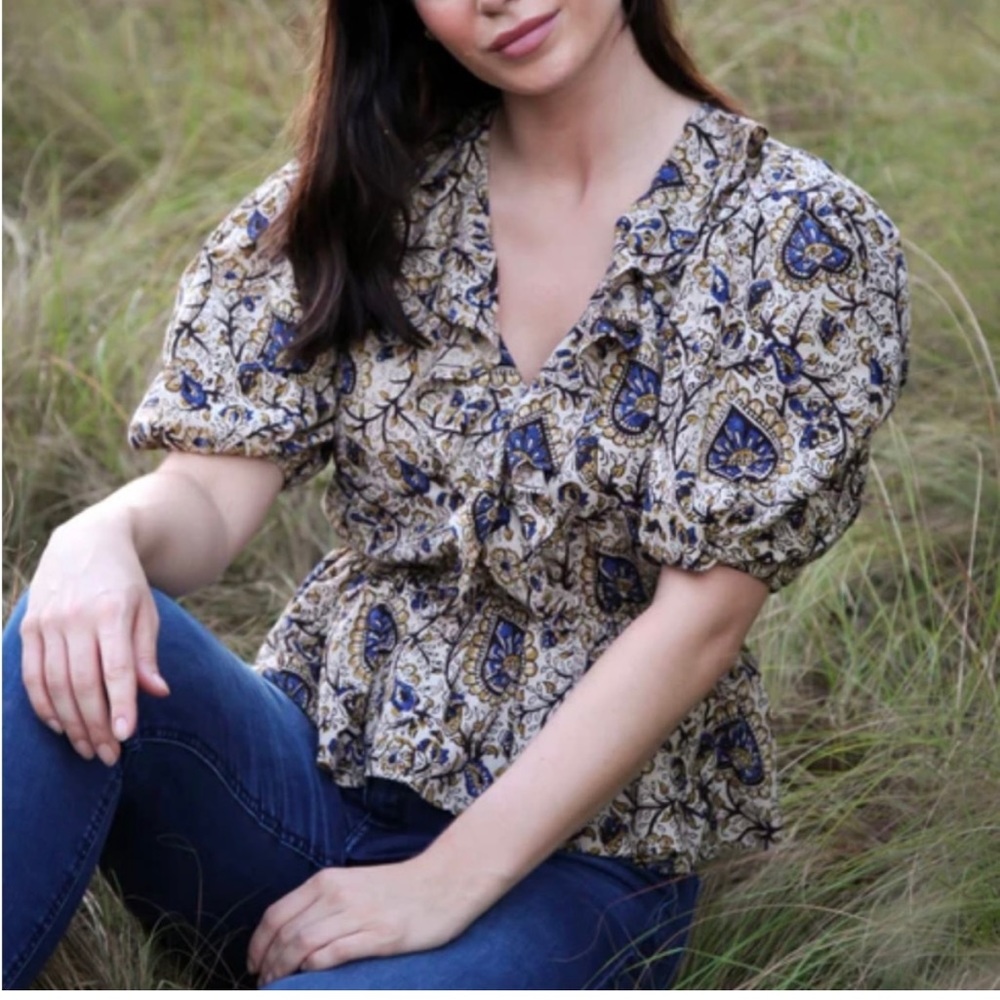 Anna Cate peplum ruffle blouse